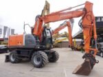 Mobilbagger Hitachi ZX140W 2008 – 14,7 t – 5410 h – Gebraucht